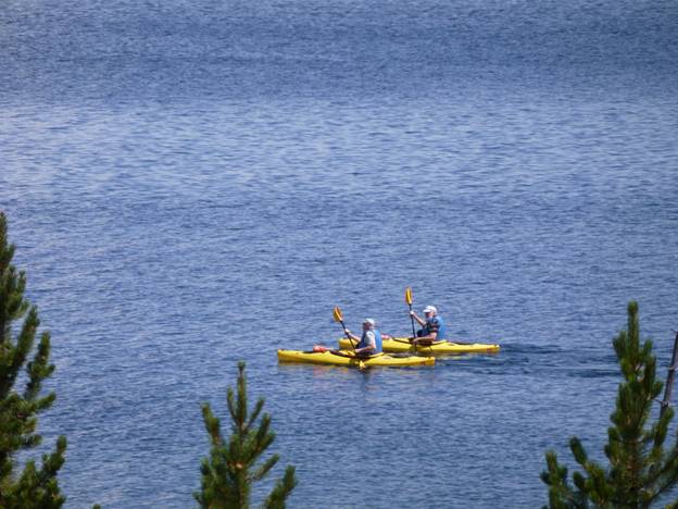 Two kayakers on Yellowstone Lake, Yellowstone National Park, Wyoming © 2012 Frosty Wooldridge